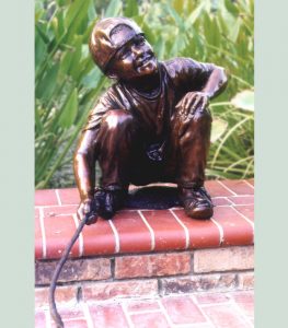 A little boy statue by Houston,Texas sculptor Bridgette Mongeon