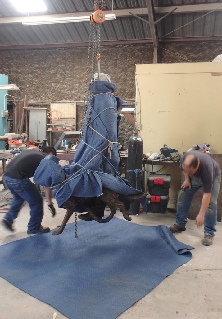 Installation of a bronze sculpture