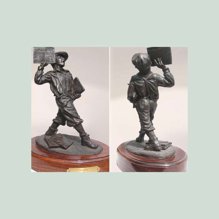 bronze newsboy statue